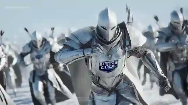 Still from the DermiCool AI film: the DermiCool ice warriors charging in formation.